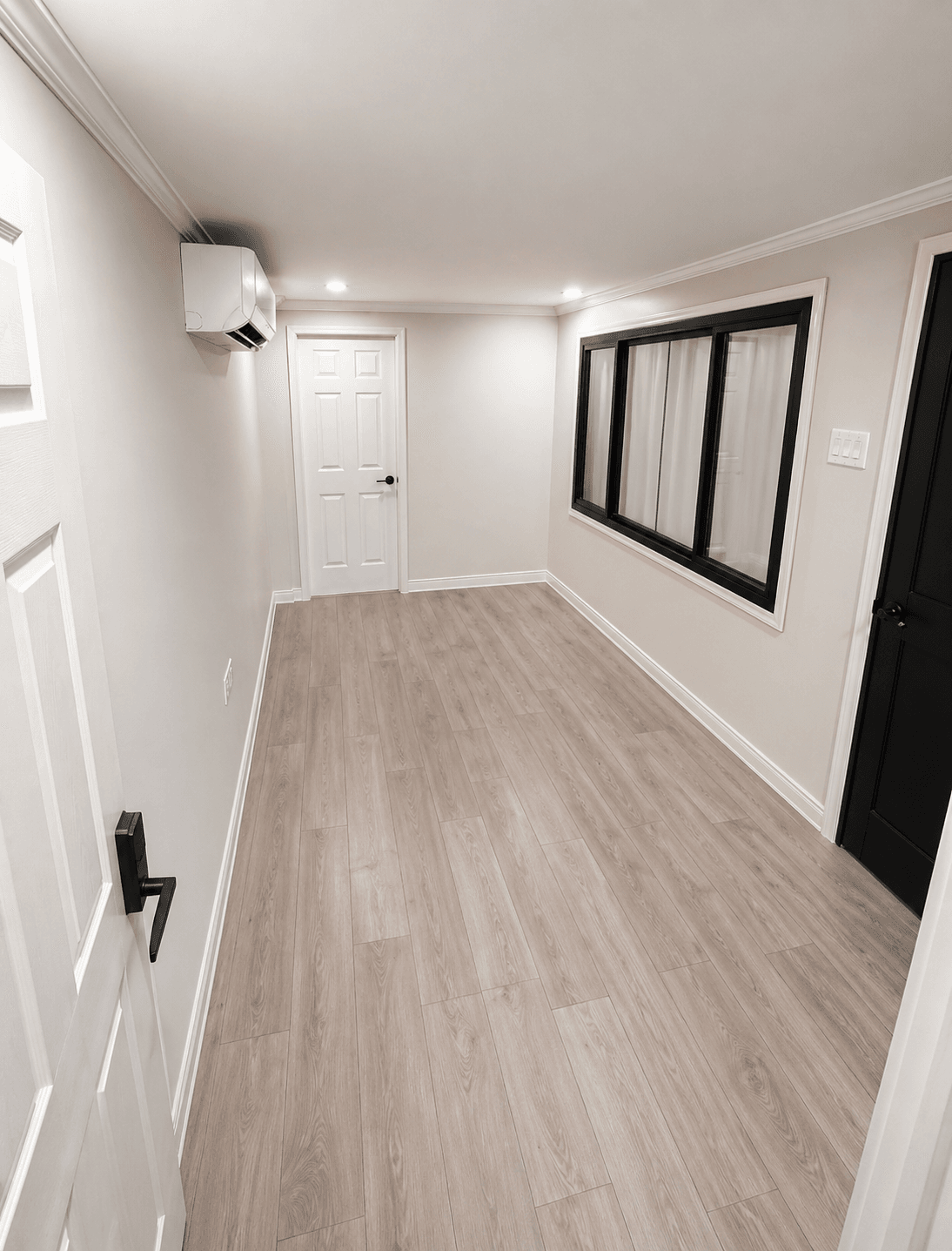 Container office interior with finished flooring and AC